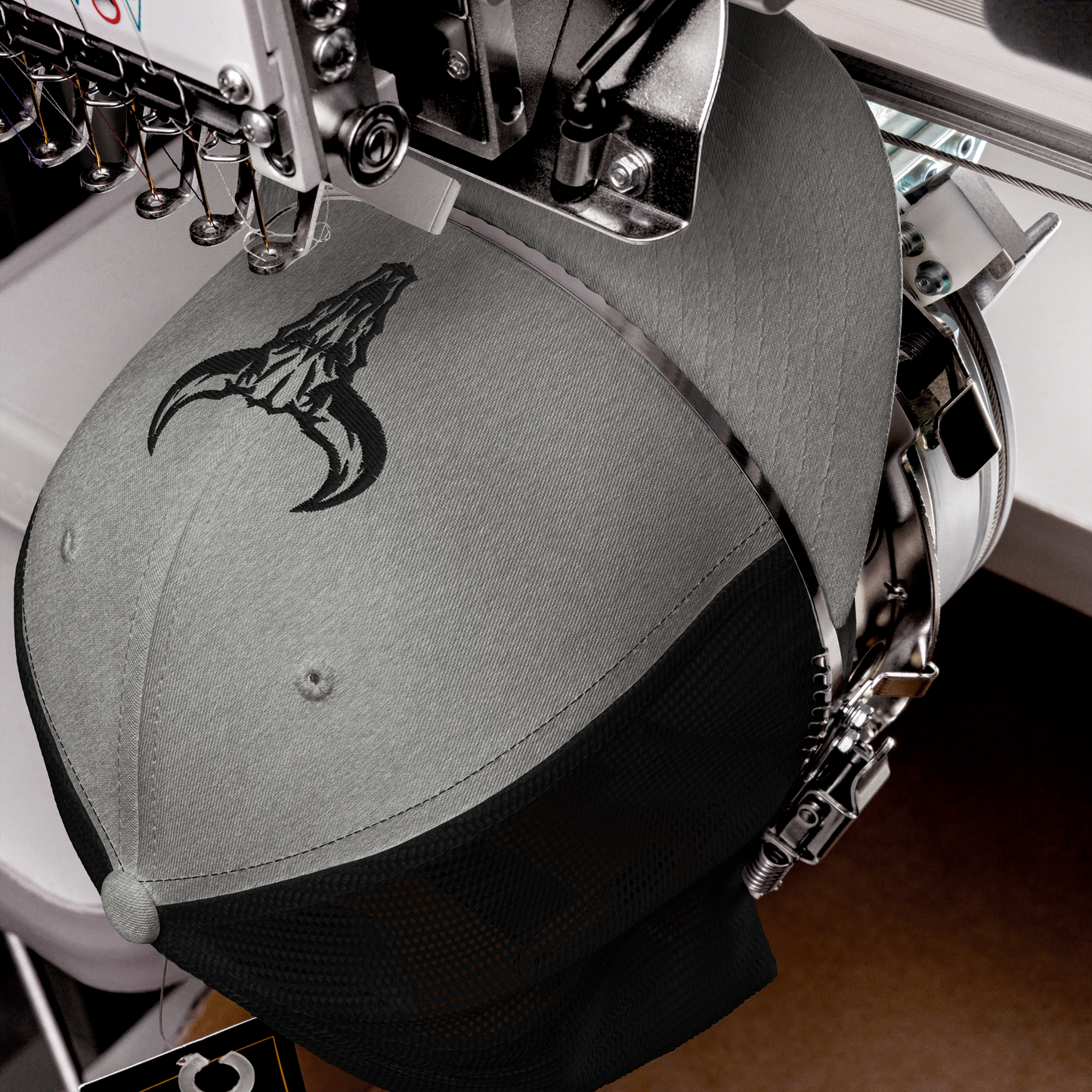 "Emblem" Trucker Cap with Embroidered Logo (Light Colors)