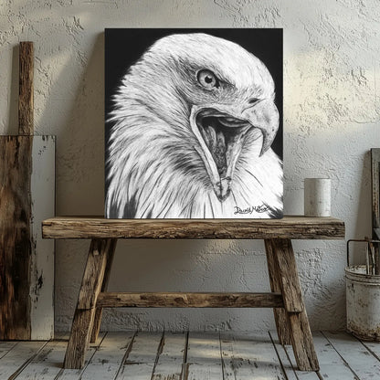 Lámina de un águila calva a carboncillo en blanco y negro sobre un banco de madera en un ambiente de estilo industrial.