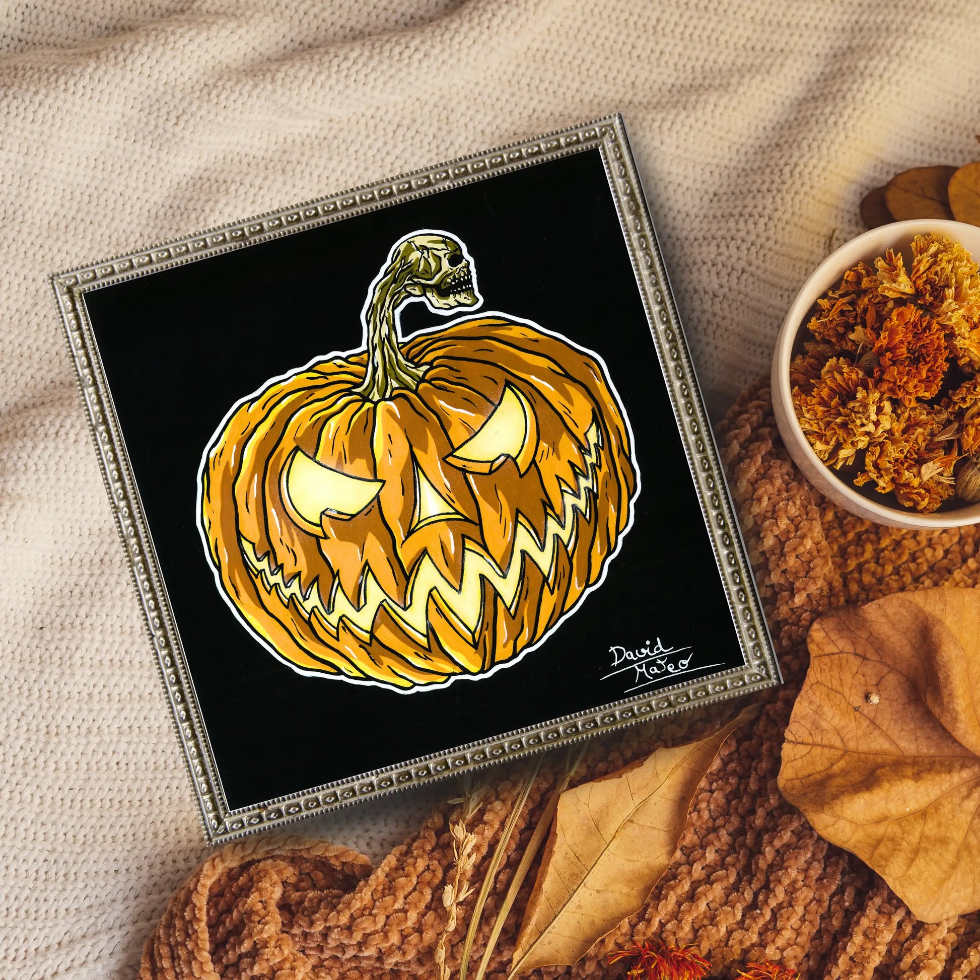 Arte mural alternativo/gótico. La linterna de calabaza con el cráneo es una pieza de arte oscuro y festivo, ideal para amantes de lo inusual.