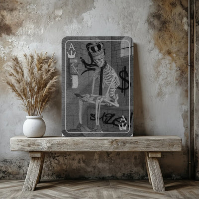 Cuadro moderno de retrato hiperrealista de arte gótico de un esqueleto de rey sentado en su trono exhibido sobre un banco de madera de estilo industrial.