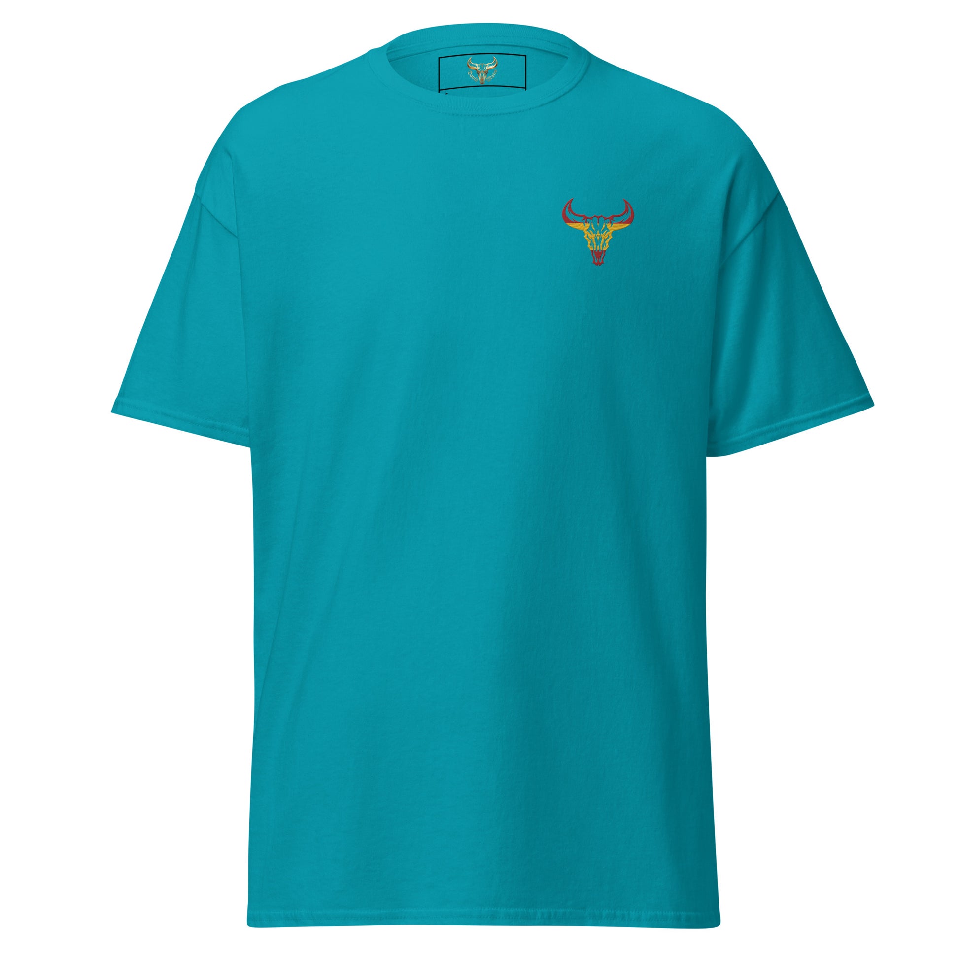 Camiseta de algodón clásica unisex azul tropical con el logo de la calavera de toro de David Mateo Art con los colores de España.
